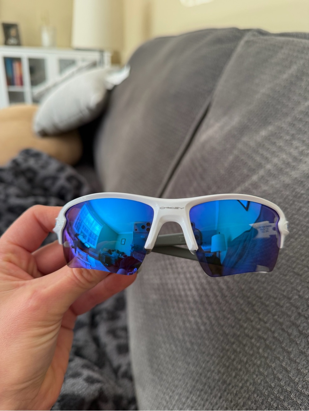 Oakley White Frame Sunglasses with Blue Gradient Mirrored Lenses